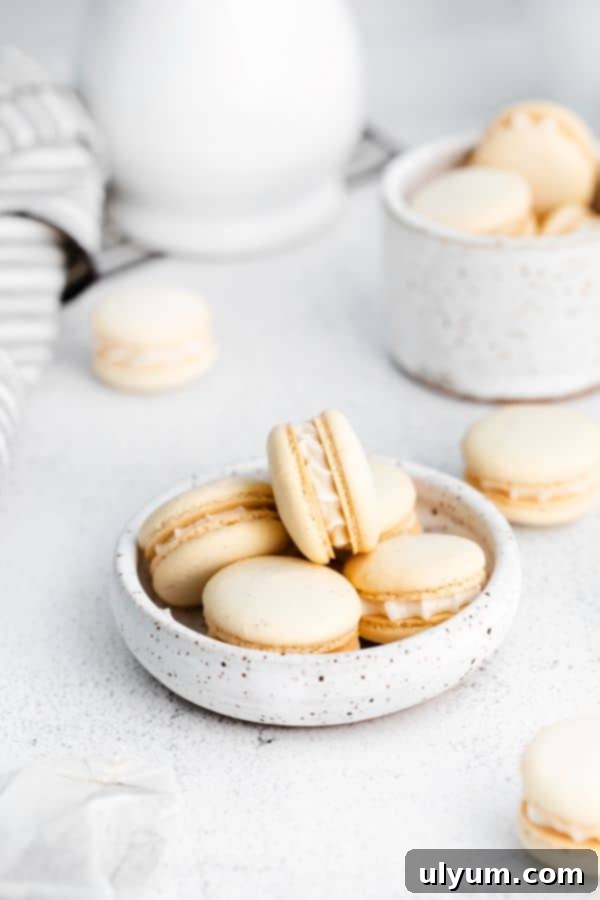 Elegant Earl Grey macarons with classic almond shells and a rich, creamy Earl Grey tea buttercream filling.