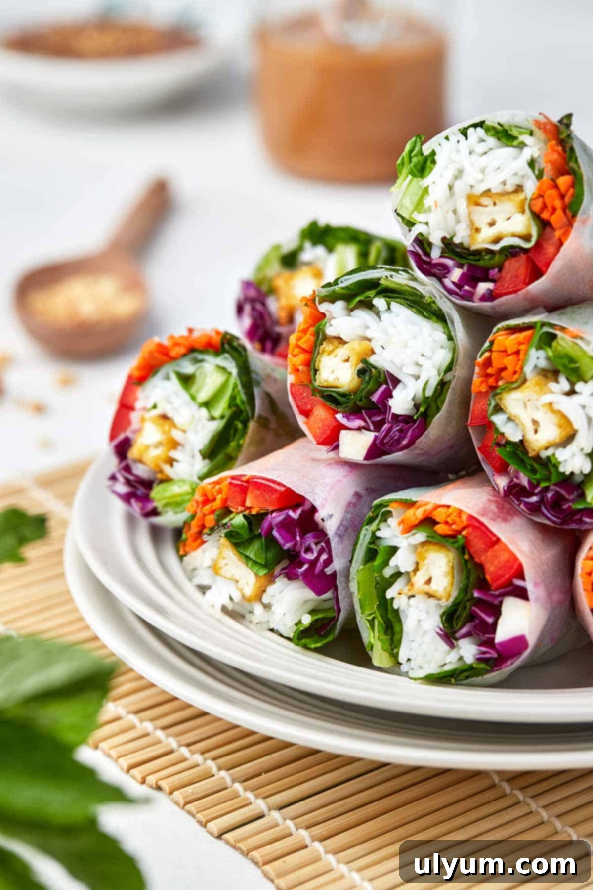 Tofu spring rolls on a platter ready to serve.