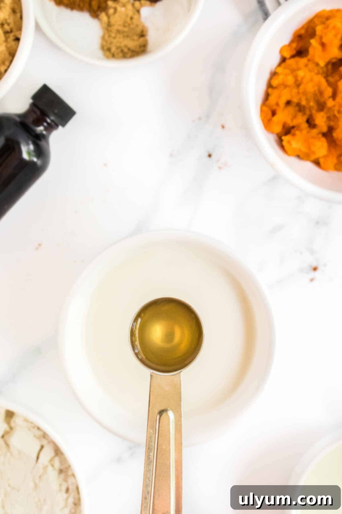 Spiced Baked Pumpkin Donuts with Velvety Cream Cheese Frosting 4 Apple cider vinegar and milk.
