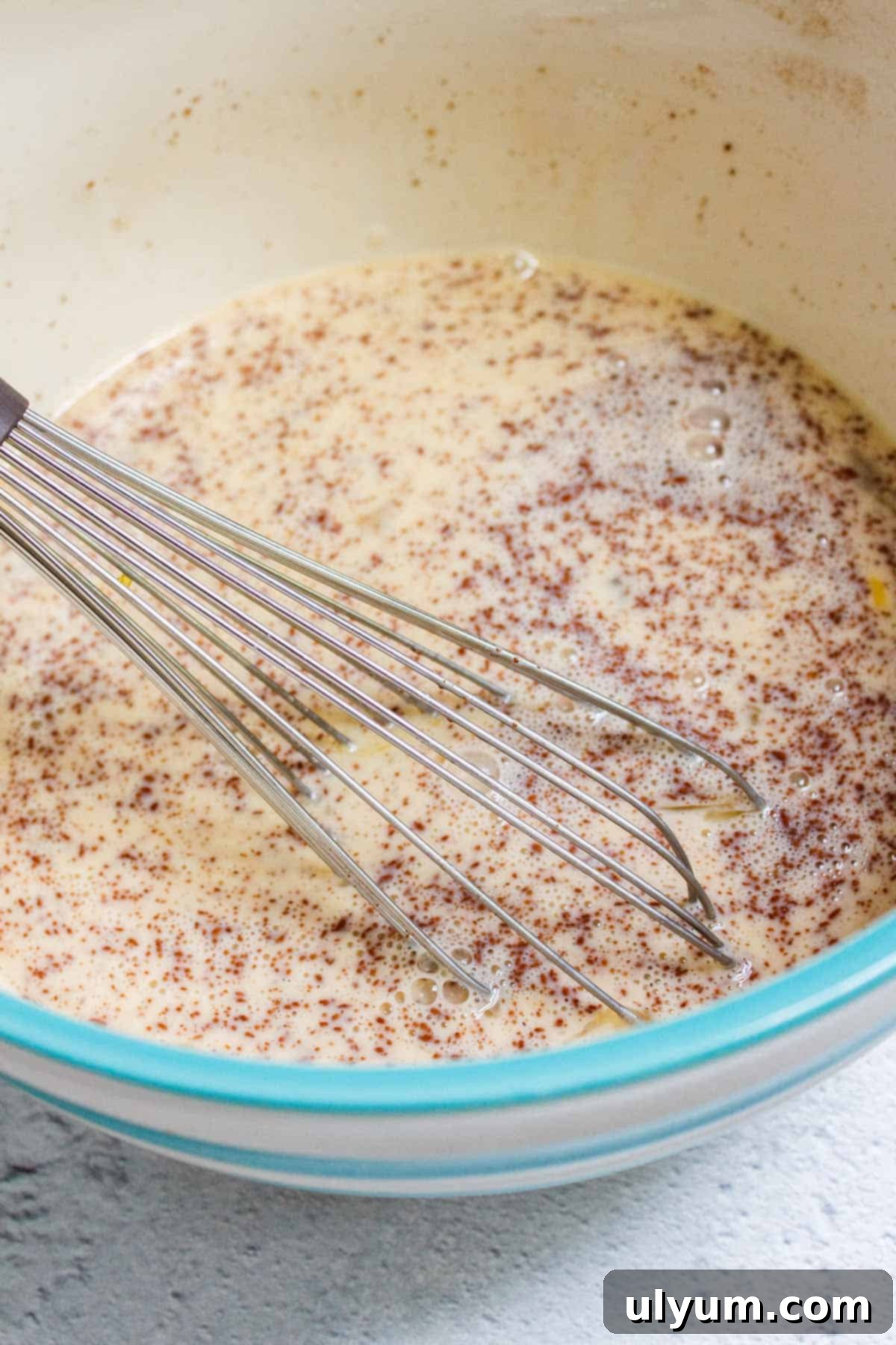 Whisked egg custard mixture.