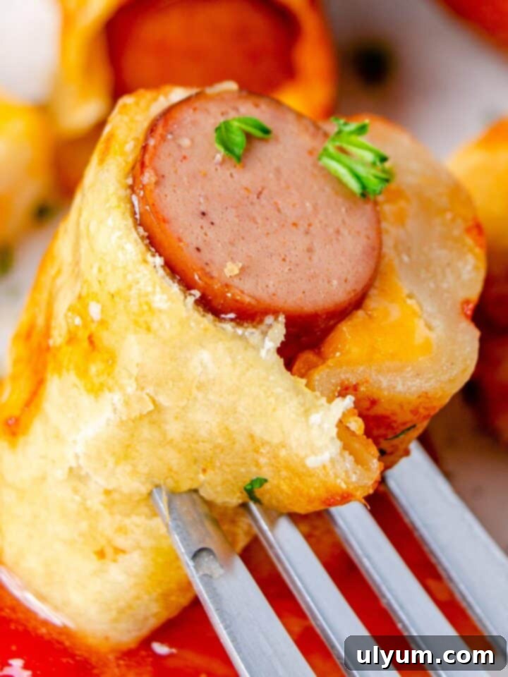 Hearty Chili Cheese Dog Bake Dinner topped with melted cheese