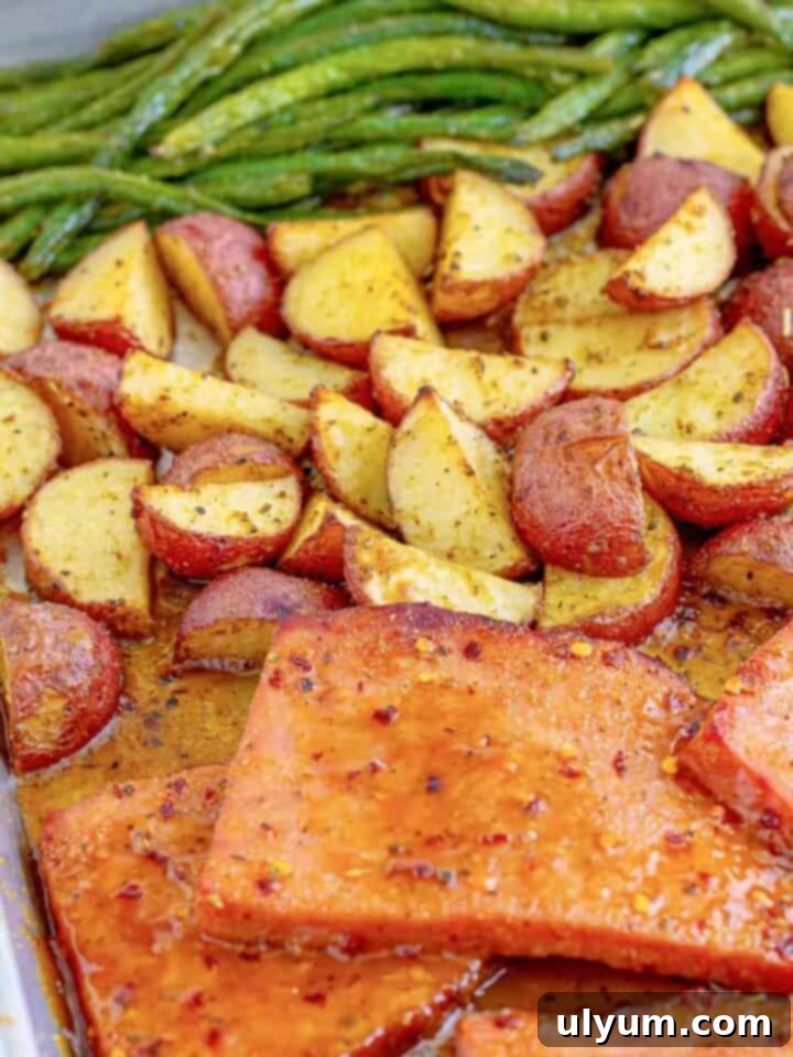 41 Easy Sheet Pan Dinner Ideas 28 Ham Steaks with Potatoes and Green Beans