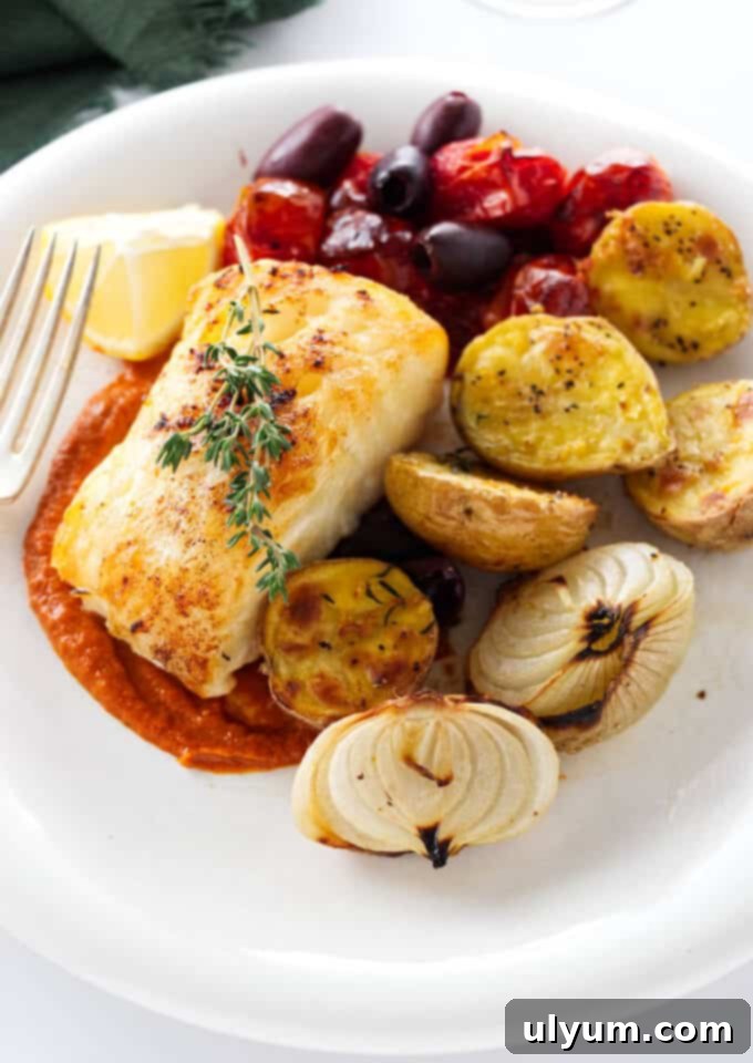 41 Easy Sheet Pan Dinner Ideas 38 Baked Sea Bass with Potatoes, Tomatoes, and Olives