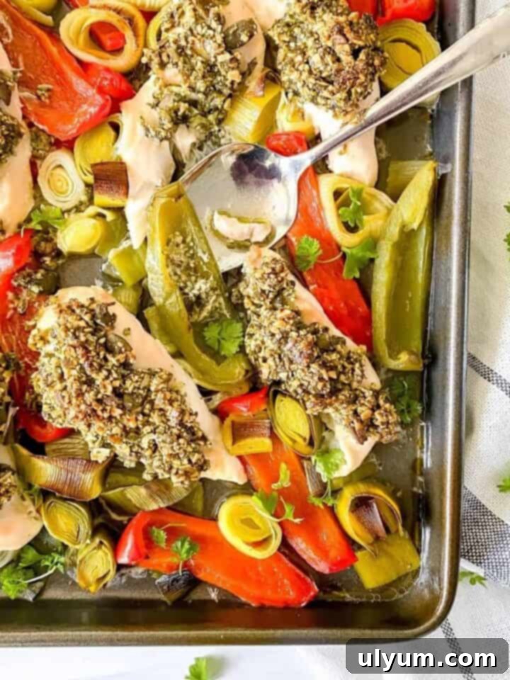 41 Easy Sheet Pan Dinner Ideas 7 Pesto Chicken Tray Bake with Vegetables