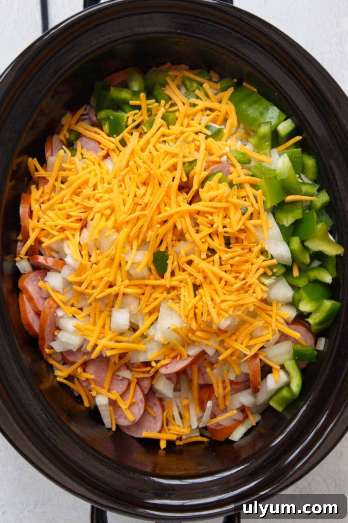 Slow Cooker Cheesy Kielbasa Hash Brown Casserole before cooking