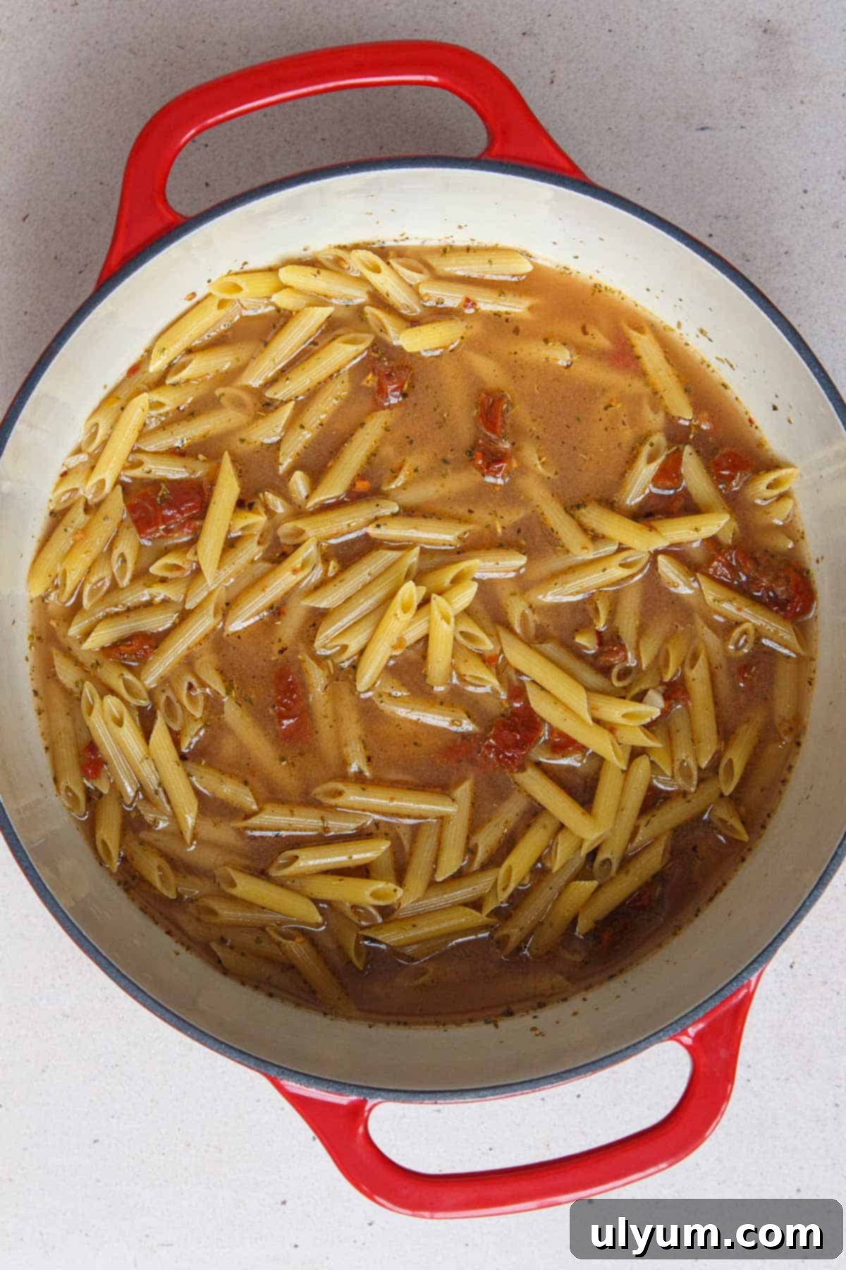 Effortless One-Pot Sun-Dried Tomato Pasta 7 Uncooked One Pot Sun-Dried Tomato Pasta mixture before simmering