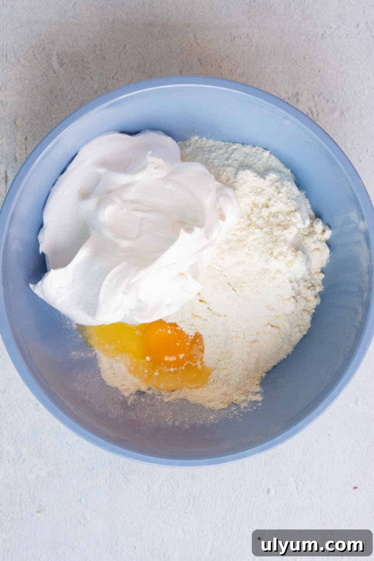 Lemon Cool Whip Cookies ingredients in a mixing bowl