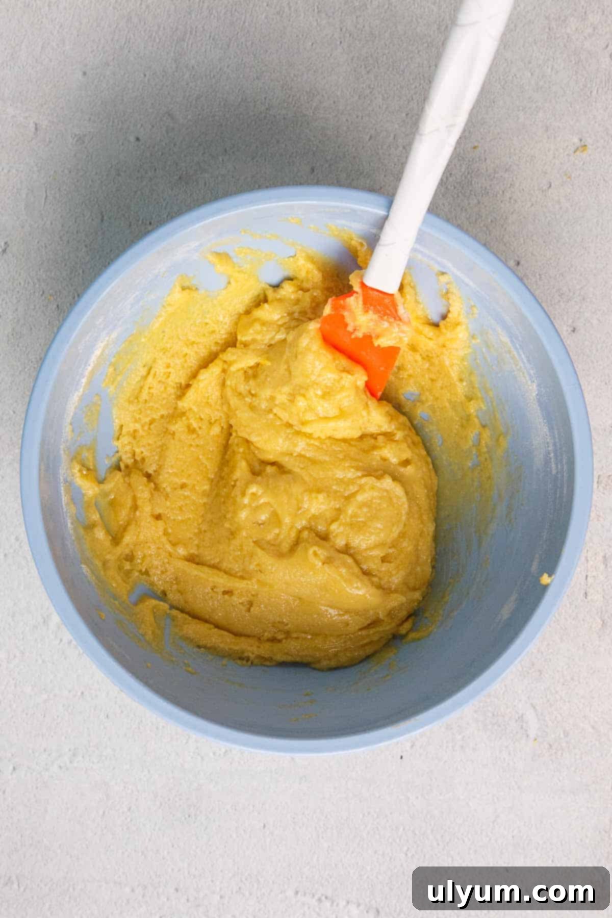Lemon cookie dough in a mixing bowl