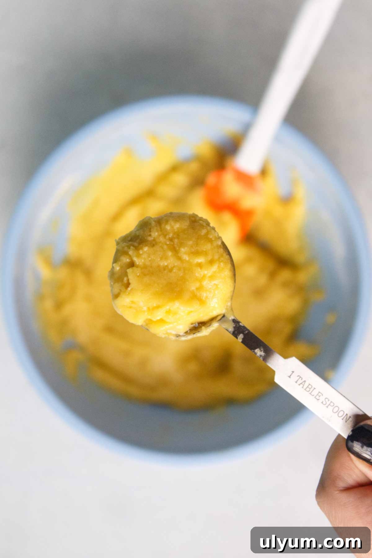 A heaping tablespoon of lemon cookie dough