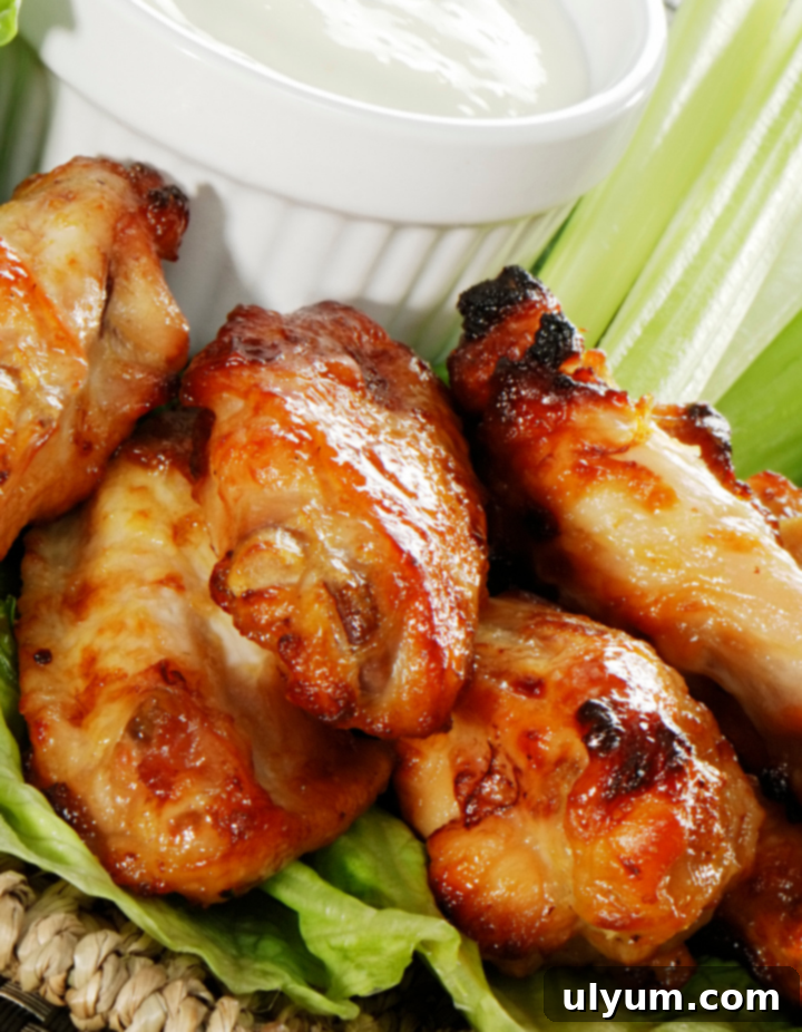 20 Genius 4 Ingredient Chicken Meals 20 Crispy Quick Air Fryer Chicken Wings on a platter