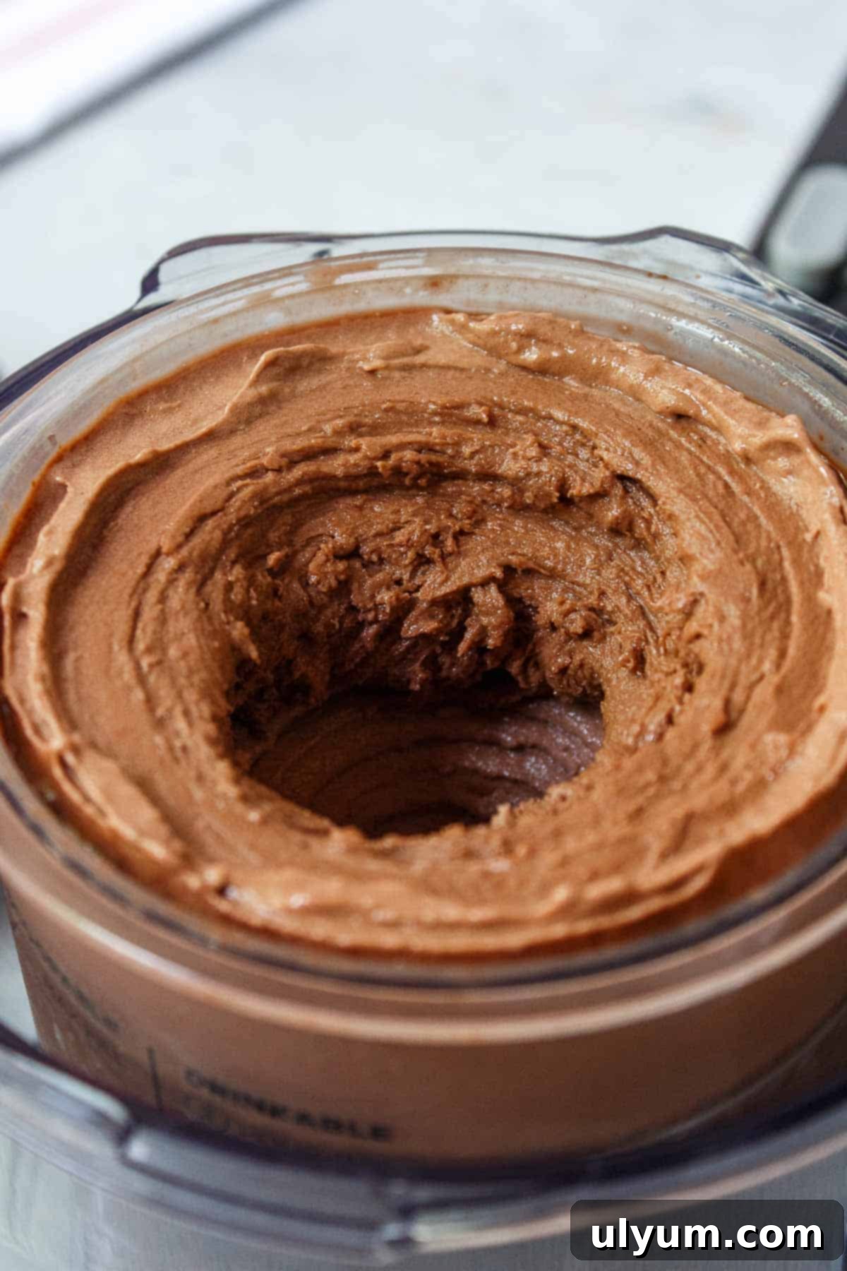 Ninja Creami Chocolate Protein Ice Cream in a pint container after being processed until smooth and creamy
