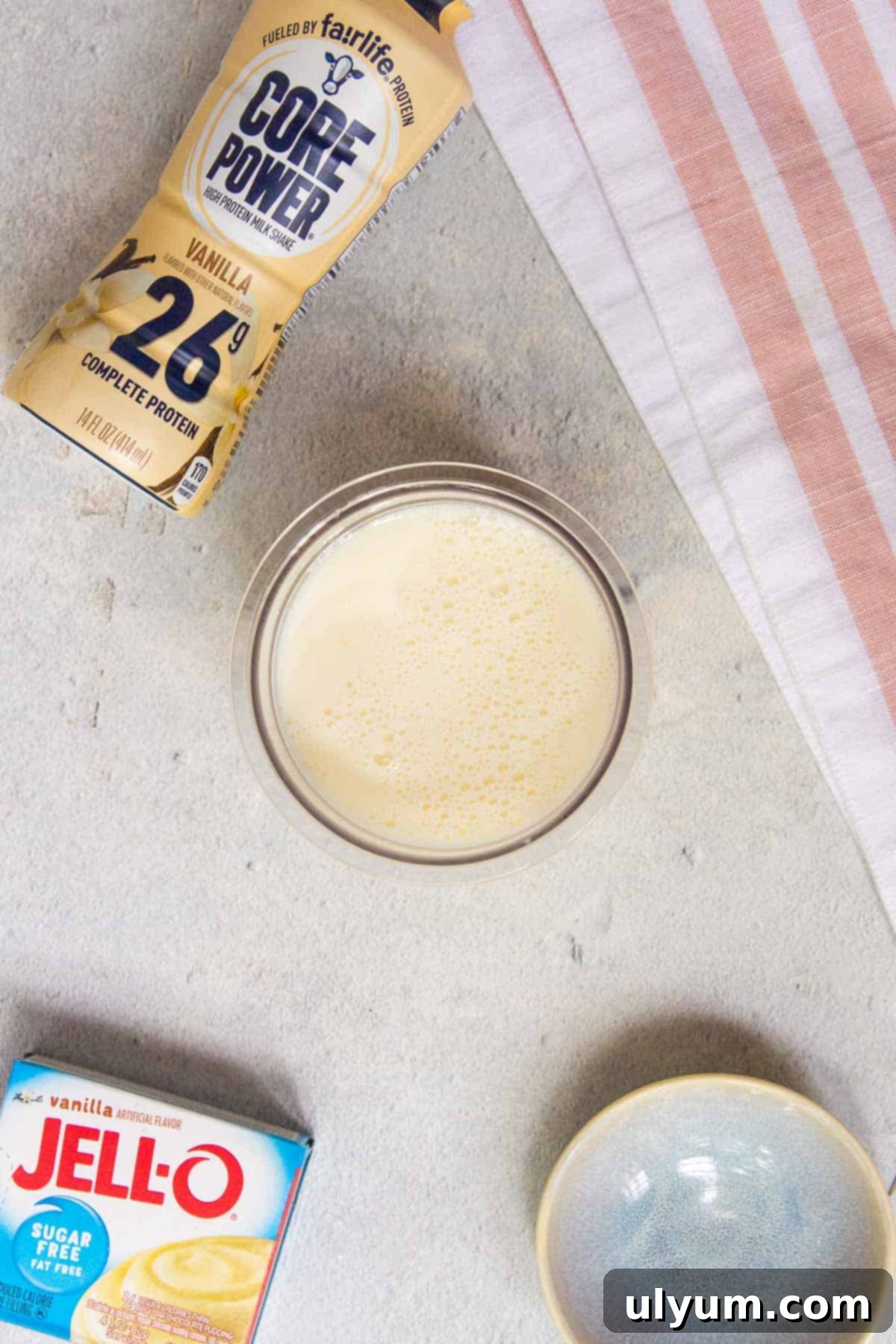 Ninja Creami Oreo Protein Ice Cream mixture in a clean pint, ready for freezing on a level surface
