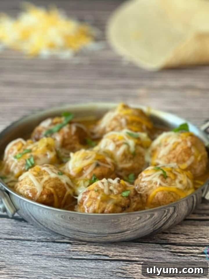 Effortless Frozen Meatball Meals 17 Ways 11 Slow Cooker Enchilada Meatballs, cheesy and vibrant.