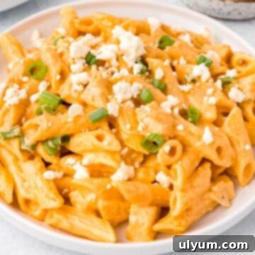 One-Pot Buffalo Chicken Mac and Cheese 14 Buffalo Chicken Pasta garnished with cheese crumbles and green onion