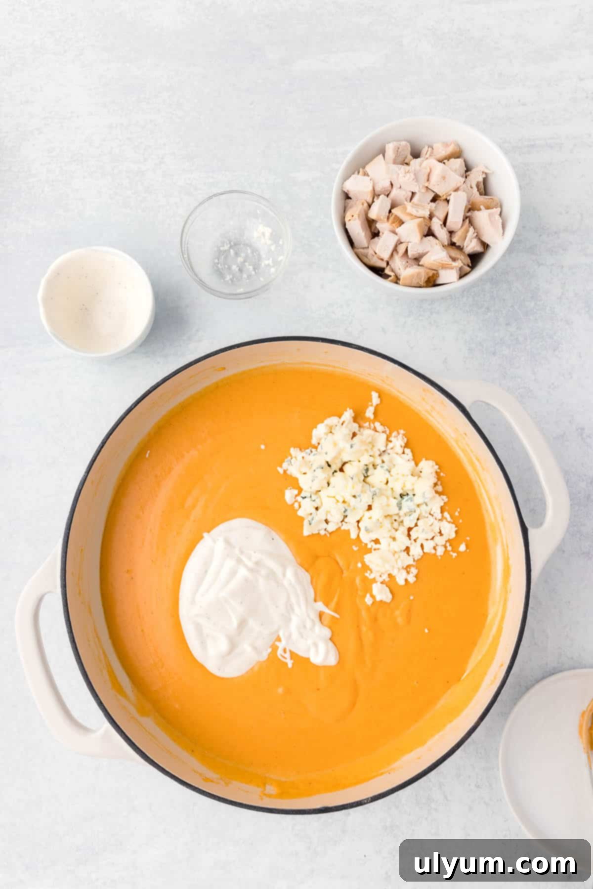 One-Pot Buffalo Chicken Mac and Cheese 8 Ranch dressing and crumbled blue cheese are stirred into the finished cheese sauce