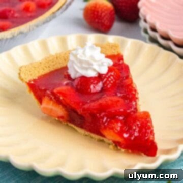 Berry Bliss Jiggle Pie 2 Slice of strawberry jello pie with a dollop of whipped topping