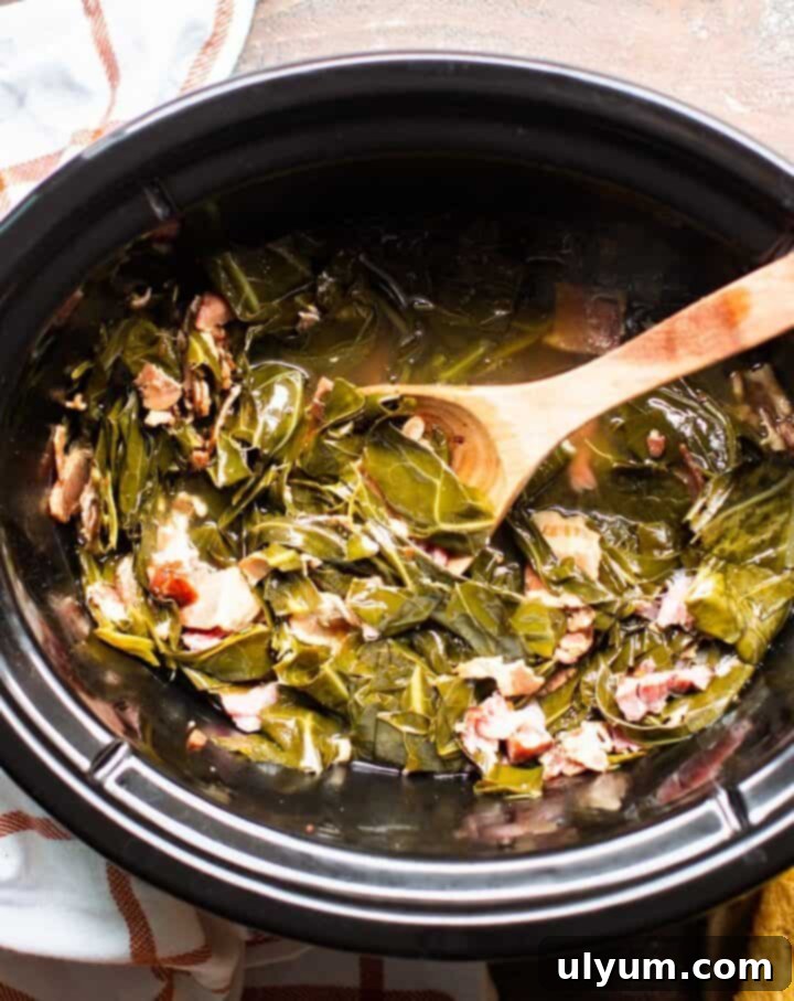 Slow Cooker Collard Greens, a soulful side dish with a rich, smoky ham flavor.