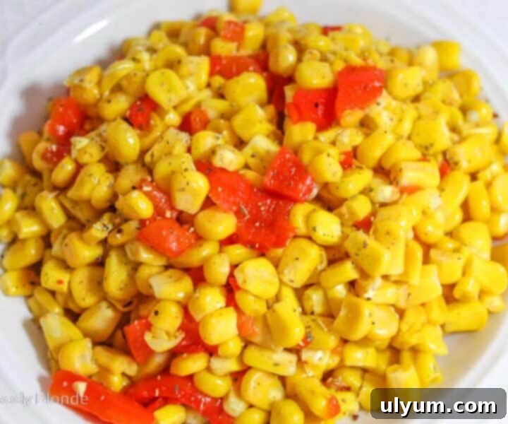 Easy Corn Salad with roasted red peppers and a tangy balsamic vinegar dressing.