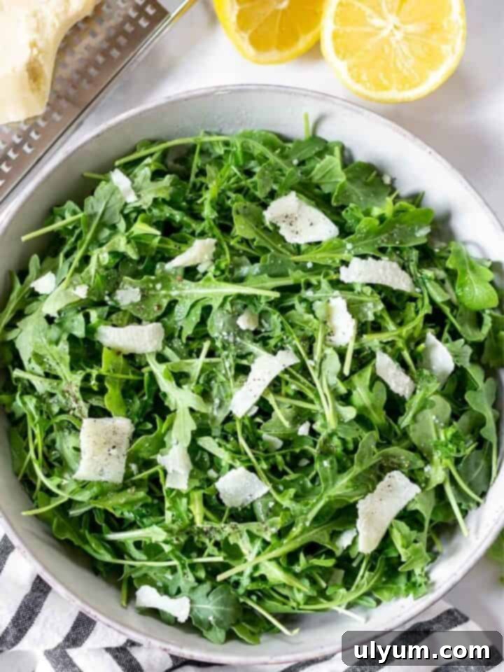 Simple Arugula Salad, an easy and peppery addition to almost any meal.