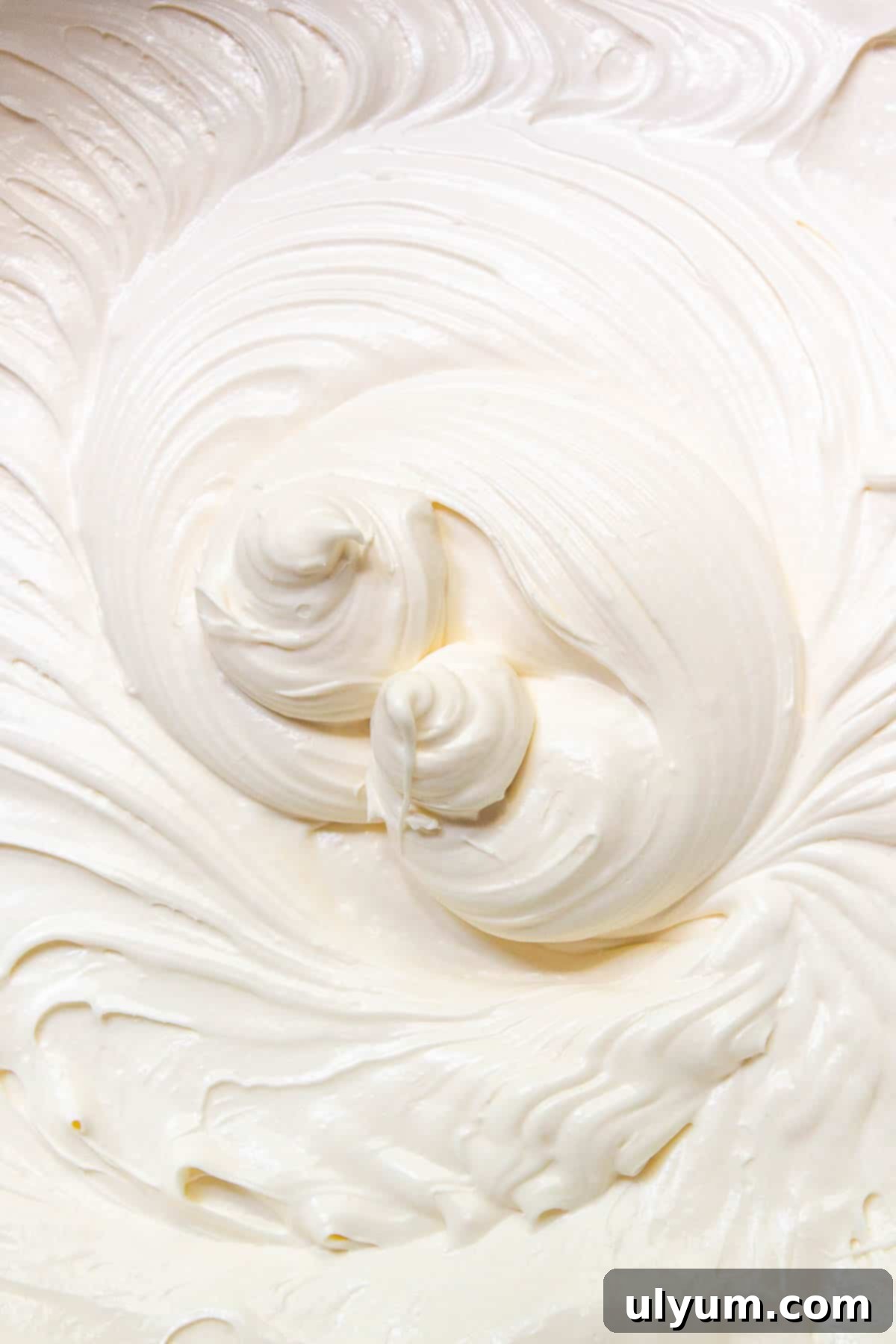 Cool Whip Cream Cheese Frosting 10 Close-up of the light and fluffy consistency of Cool Whip Cream Cheese Frosting, ready for use.