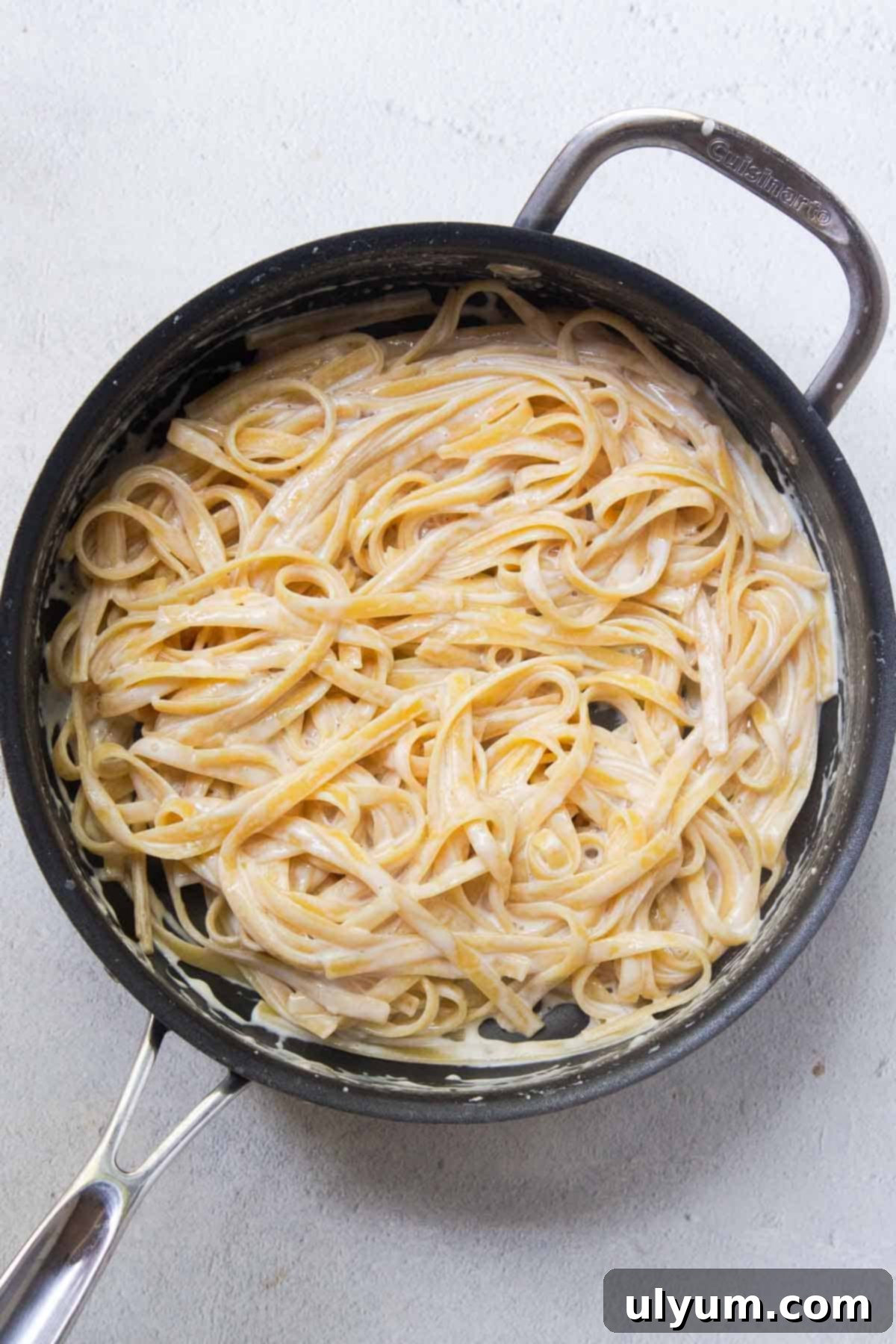 The pasta is cooked until al dente and most of the liquid has been absorbed