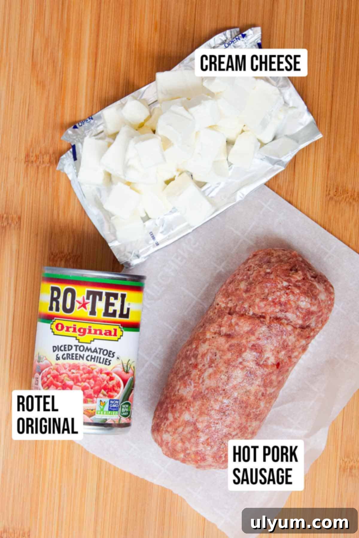 Cream cheese sausage dip ingredients: Rotel, cream cheese, and hot pork sausage.