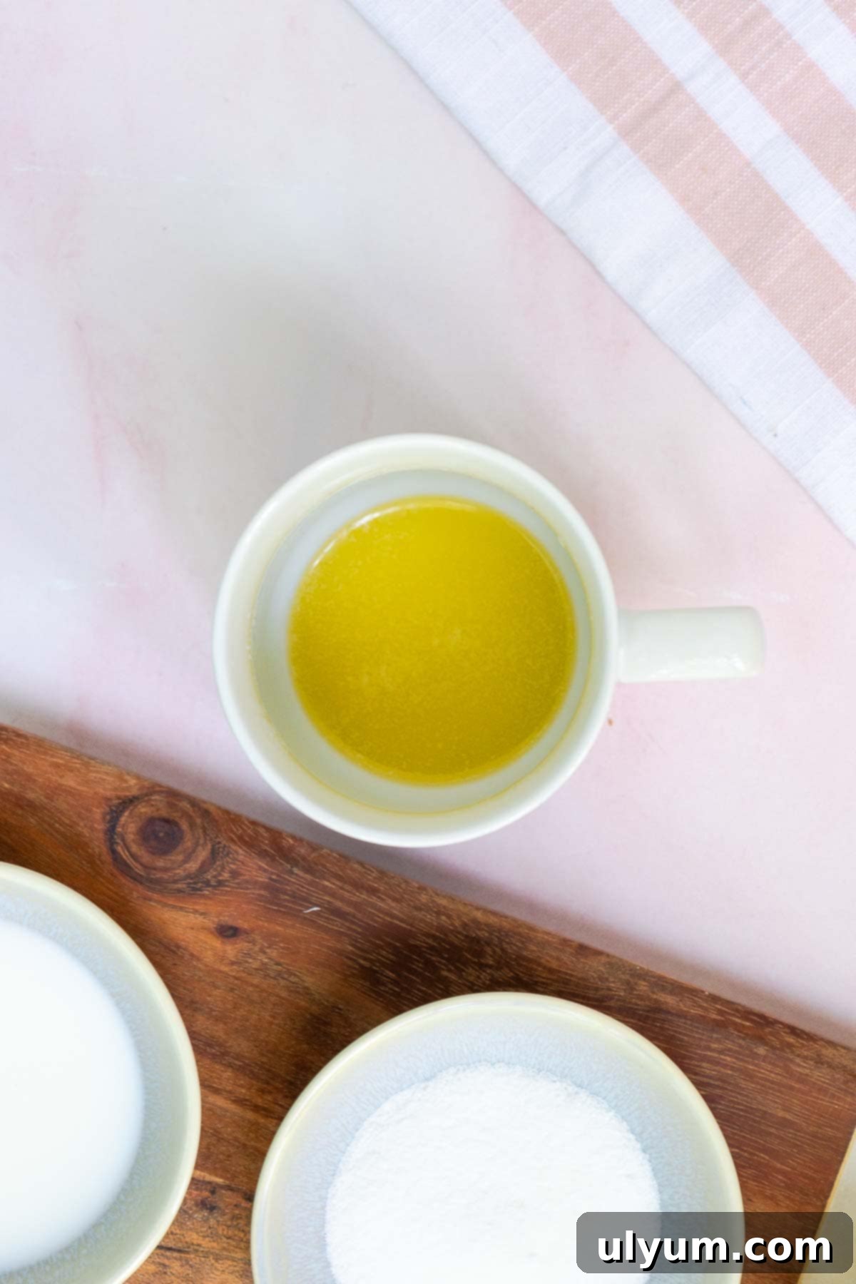 Melted butter in a mug.