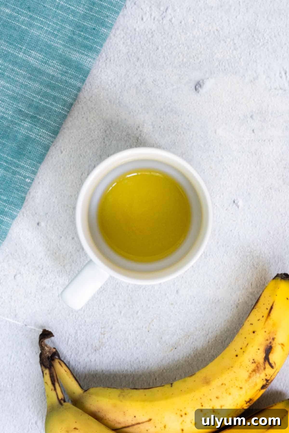 Melted butter in a mug.