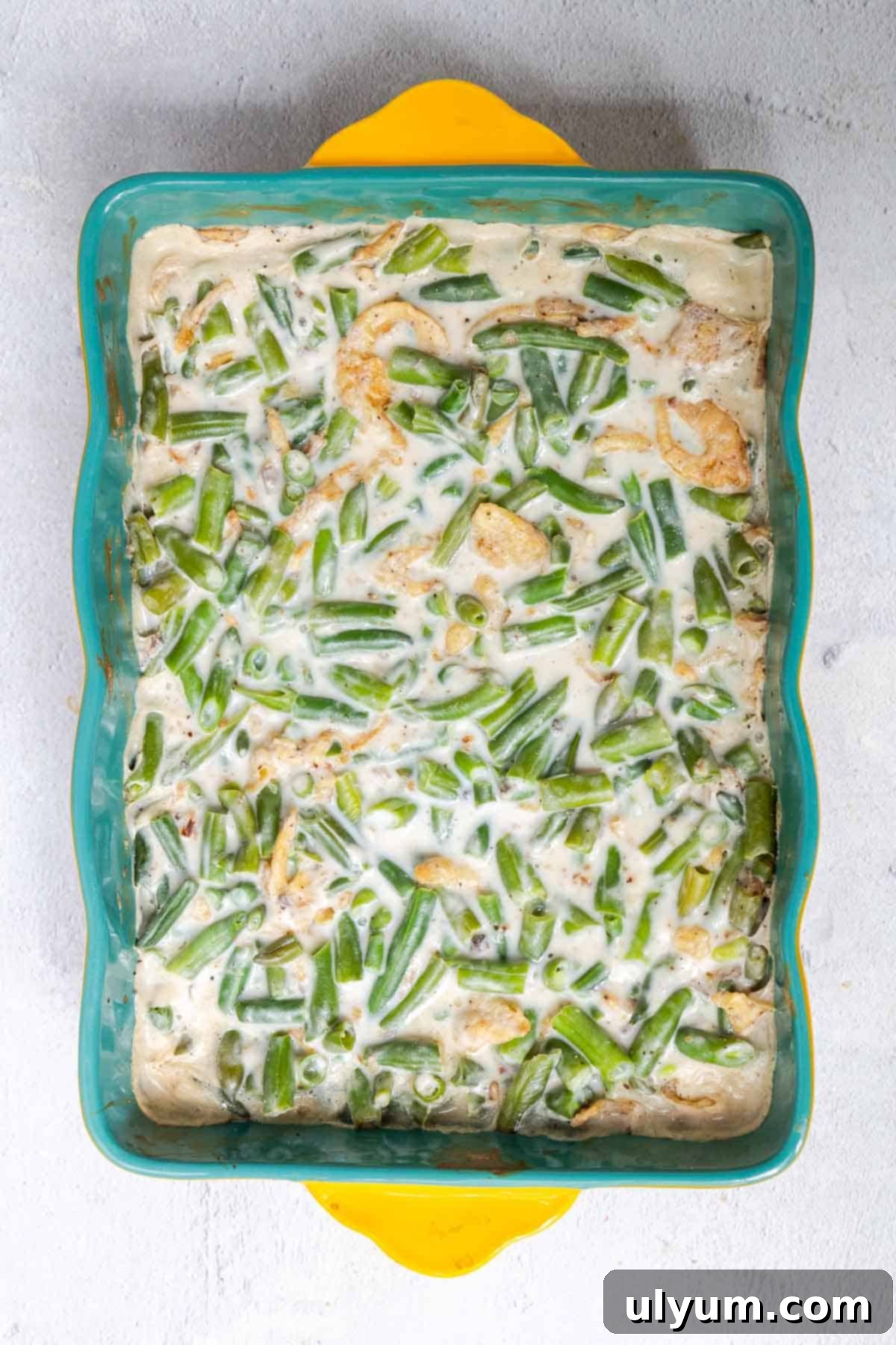 Holiday-Sized Green Bean Casserole 5 The green bean casserole filling is baked until warmed through and bubbling.