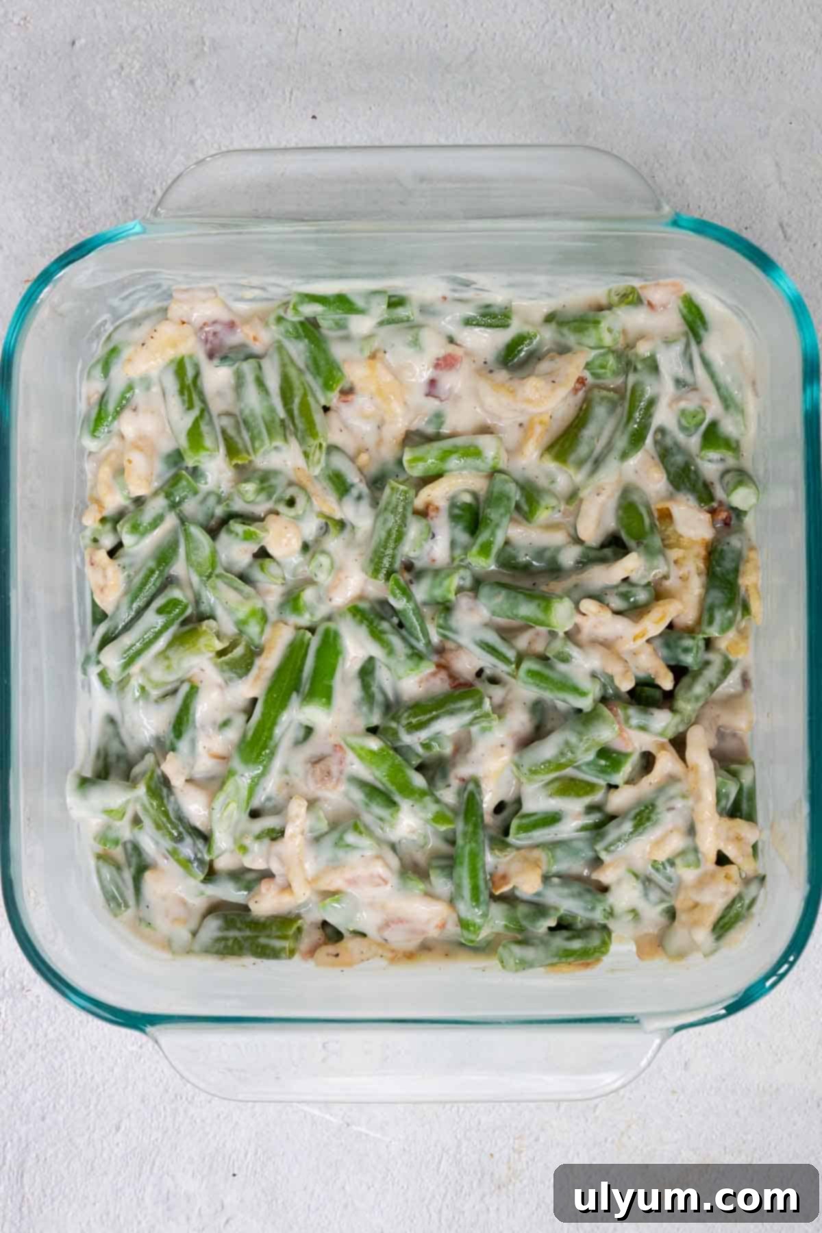 The green bean mixture is mixed directly in the 8 by 8 inch baking dish.