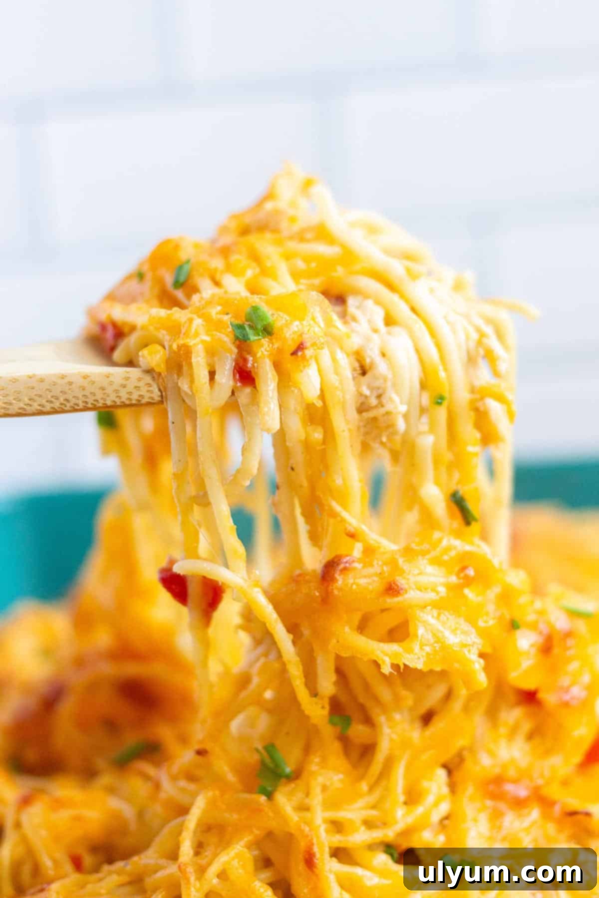 Baked chicken spaghetti, a comforting chicken pasta casserole.