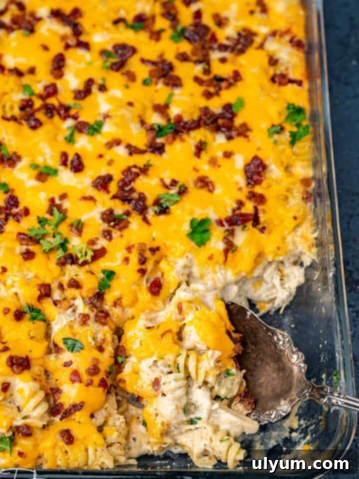 Crack Chicken Pasta Bake topped with bacon.