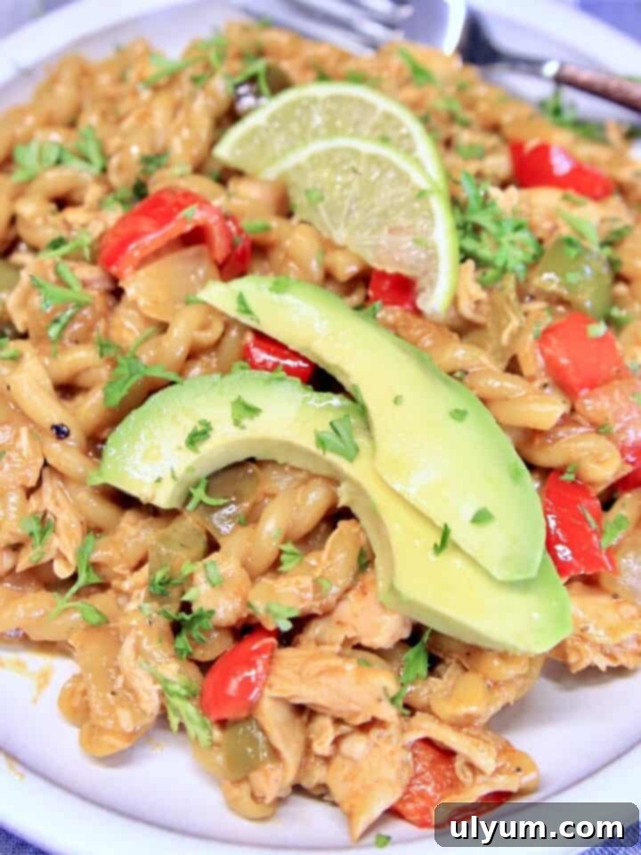 Easy Chicken Fajita Pasta in a skillet.