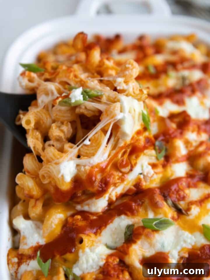 Baked Buffalo Chicken Pasta with blue cheese crumbles.