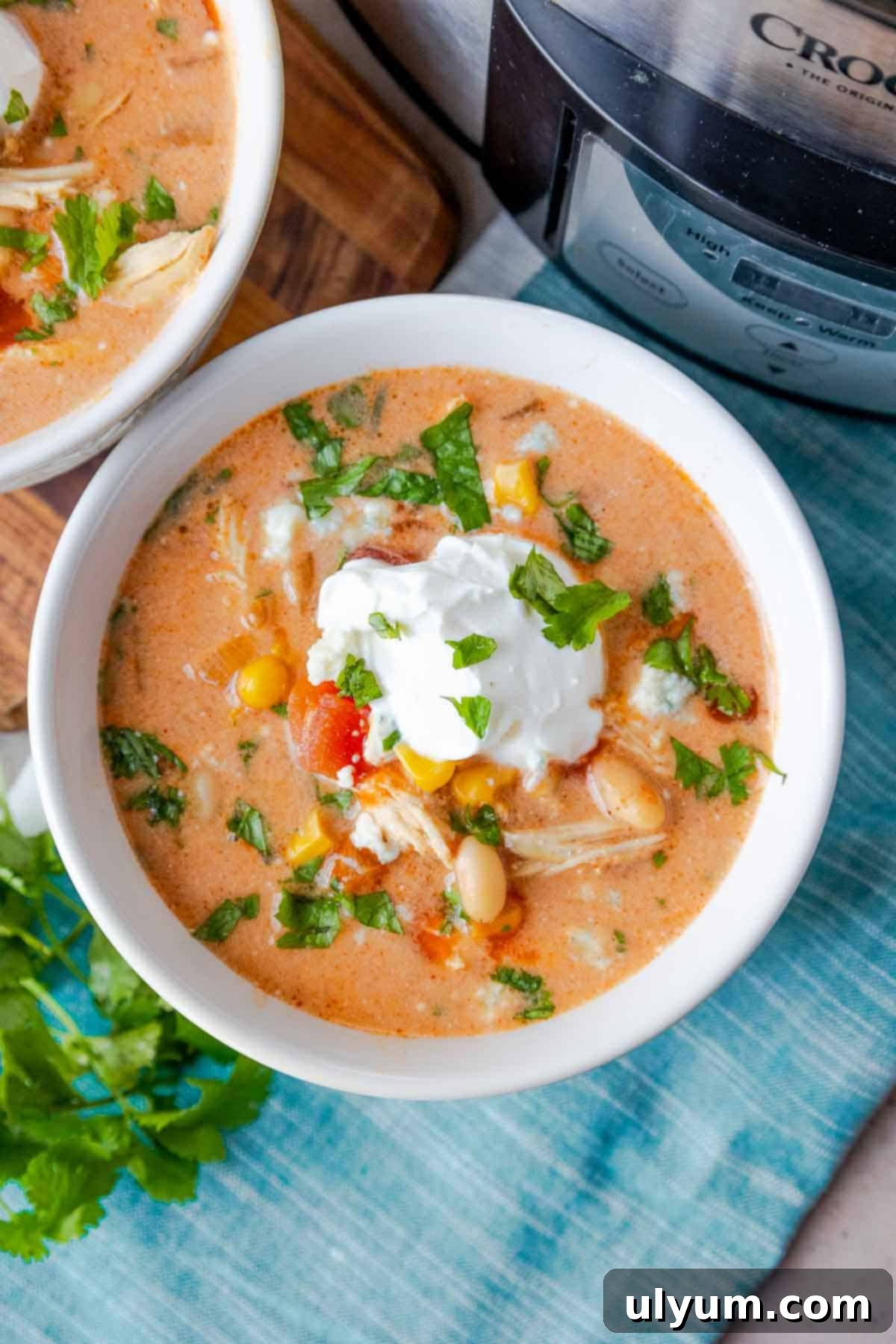 Creamy buffalo chicken chili topped with sour cream.