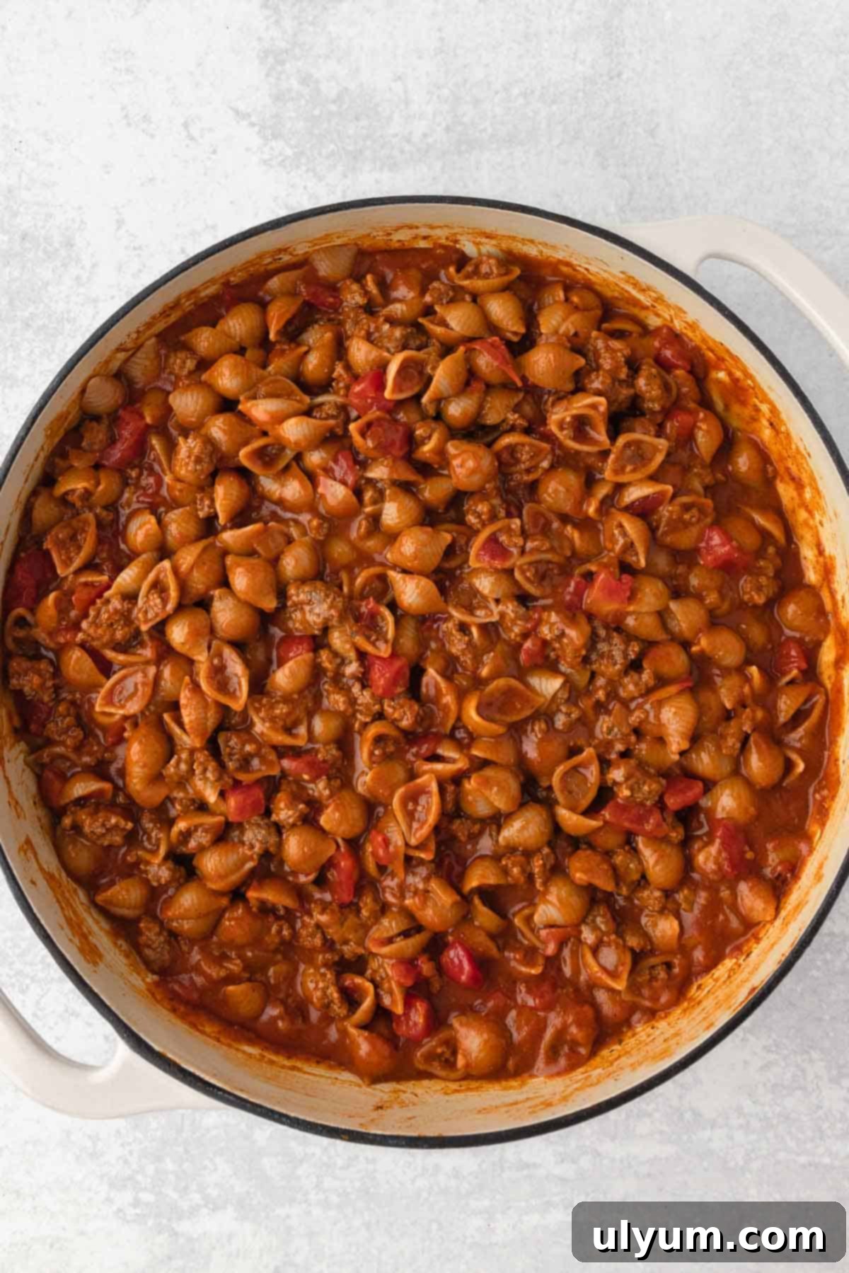 The Ultimate One-Pot Cheesy Taco Pasta 8 The liquid in the taco pasta is reduced and thickened into a sauce.