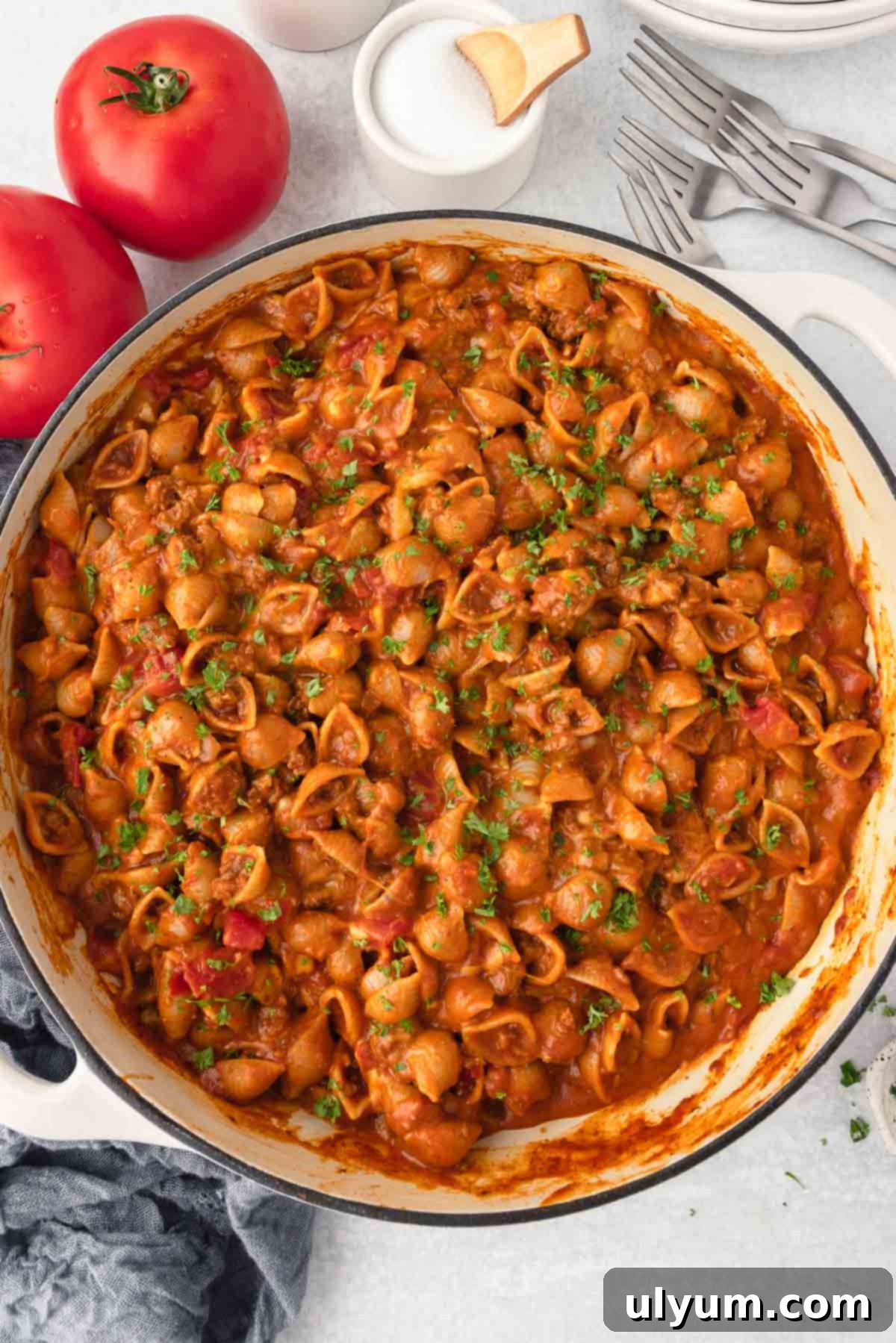 The Ultimate One-Pot Cheesy Taco Pasta 10 A large pot of taco pasta garnished with fresh cilantro.