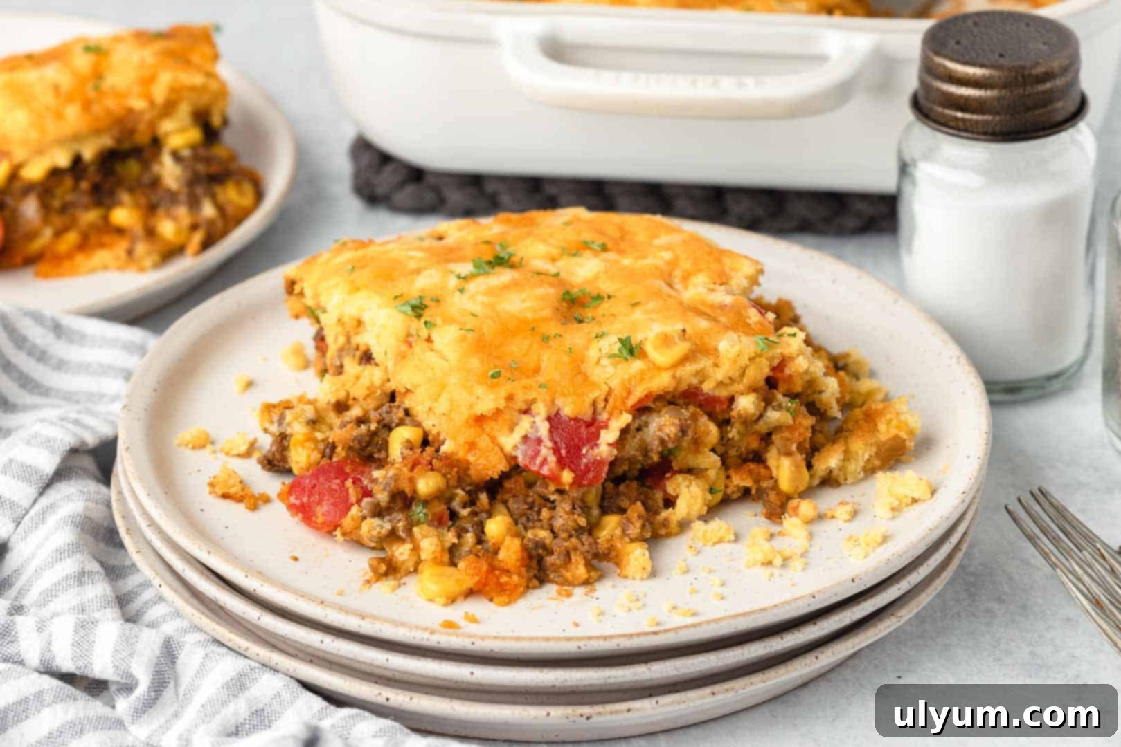 Ground Beef Jiffy Cornbread Casserole, a close-up shot of a slice
