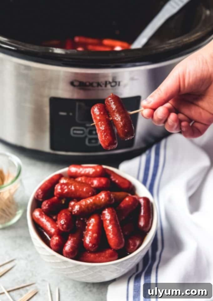 Score Big: 48 Instant Pot & Slow Cooker Game Day Eats 16 Slow Cooker Little Smokies in a delicious honey garlic BBQ sauce.