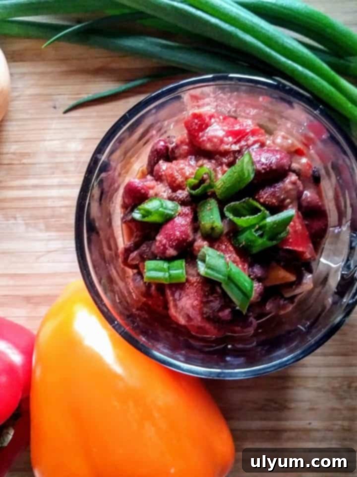 Score Big: 48 Instant Pot & Slow Cooker Game Day Eats 31 Slow Cooker Vegan Chili, a simple and satisfying plant-based meal.