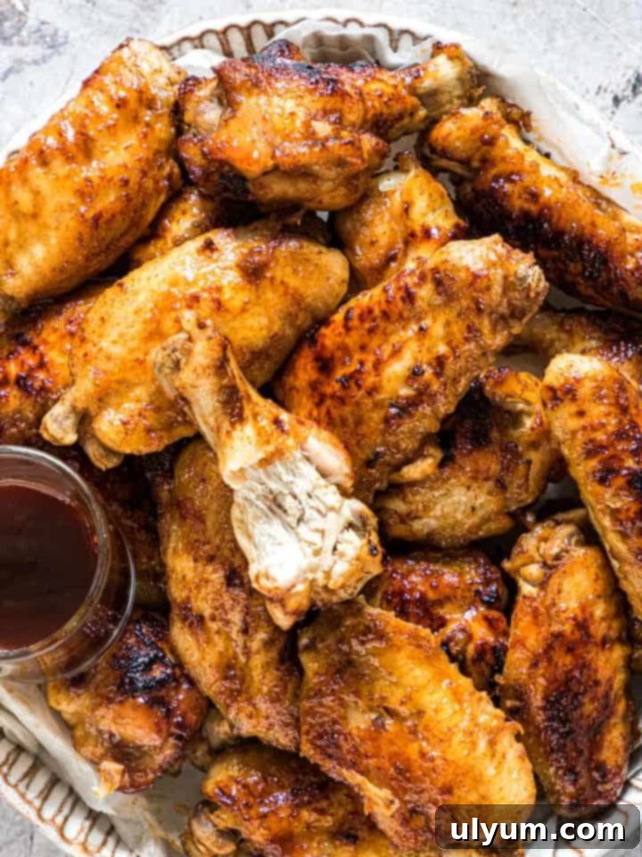 Score Big: 48 Instant Pot & Slow Cooker Game Day Eats 33 Instant Pot Coca Cola Chicken Wings, sticky and delicious.
