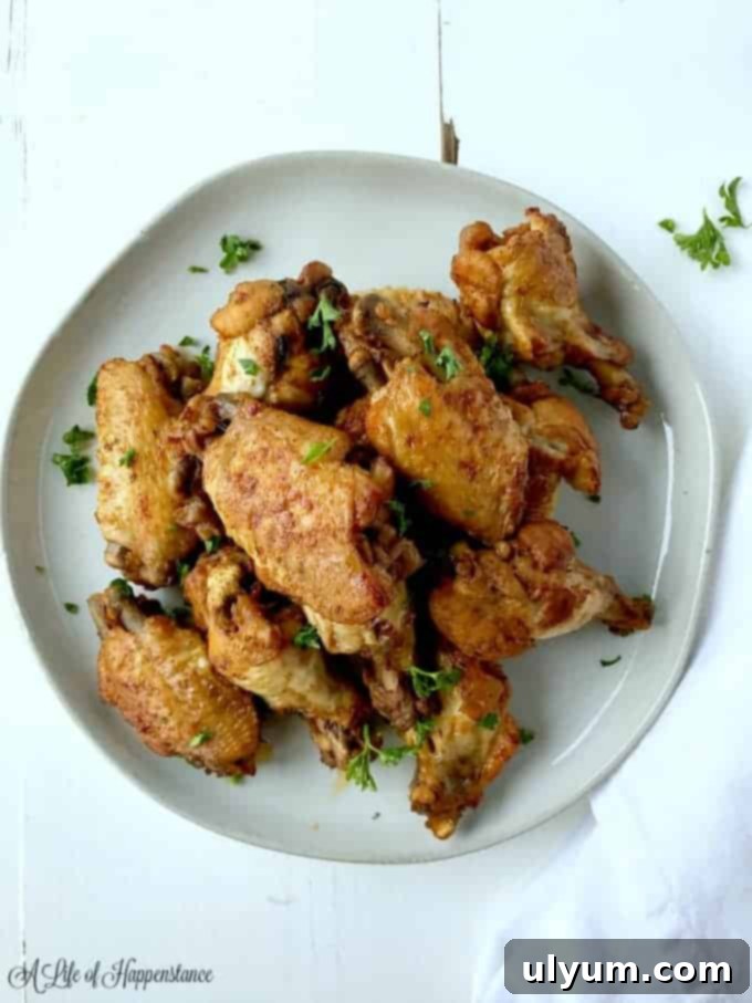 Score Big: 48 Instant Pot & Slow Cooker Game Day Eats 36 Instant Pot Piri Piri Chicken Wings, low carb and full of flavor.