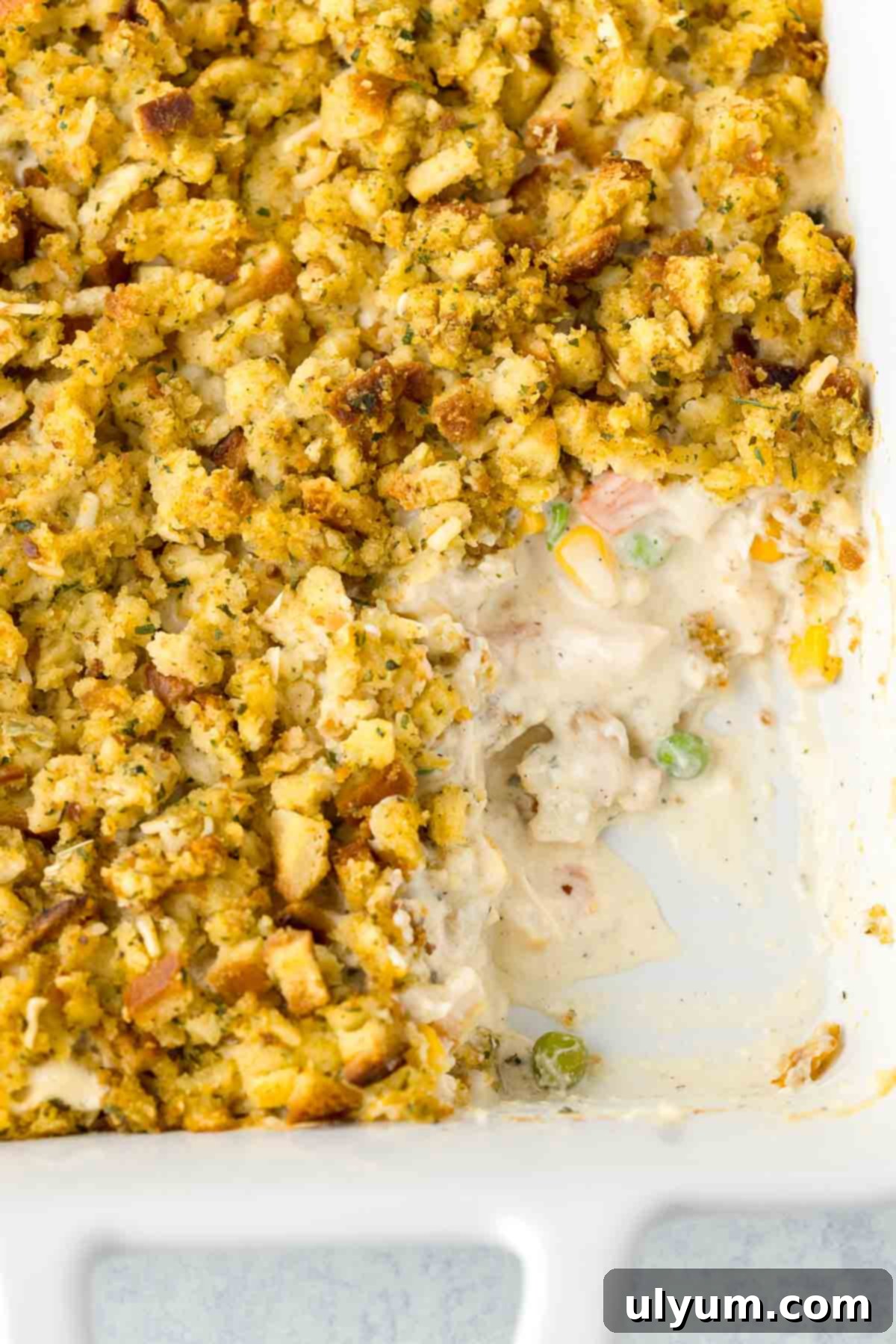 The Unexpected Ease of Shortcut Cooking: Reclaiming Meal Planning 5 Chicken Stuffing Casserole baked in a casserole dish. The chicken layer is creamy and the stuffing layer is golden.